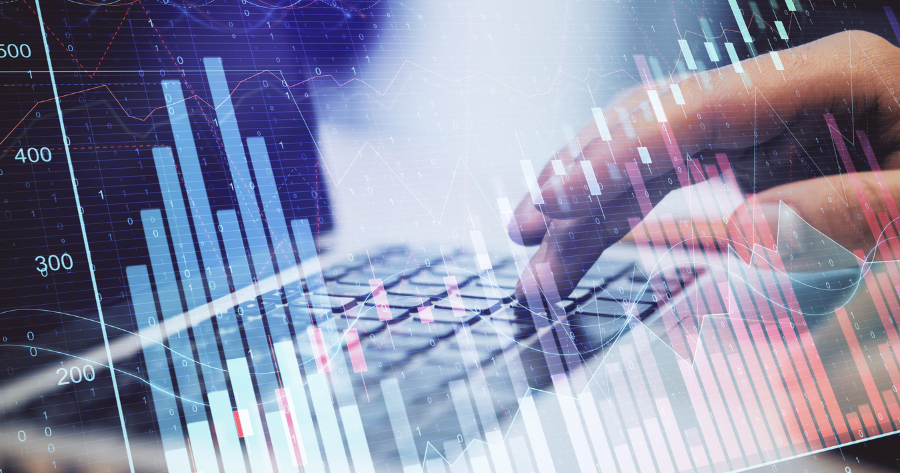 Abstract financial visualization with a hand typing on a laptop keyboard, overlaid with bar charts, line graphs, and binary code in blue tones, representing data analytics and billing intelligence.